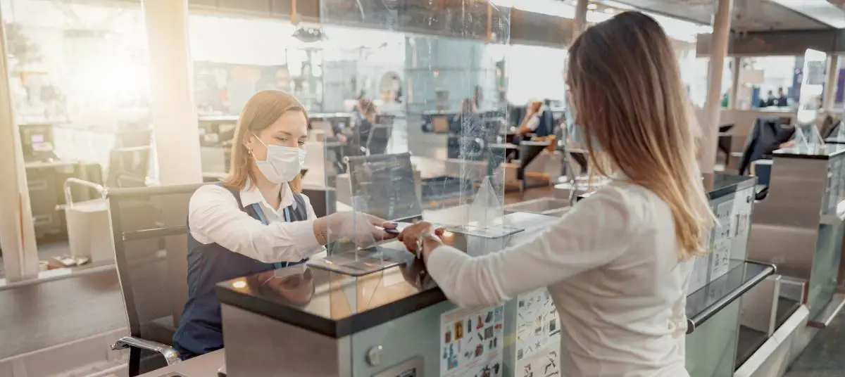 Immigration counter processing documents for UAE residency and visa services