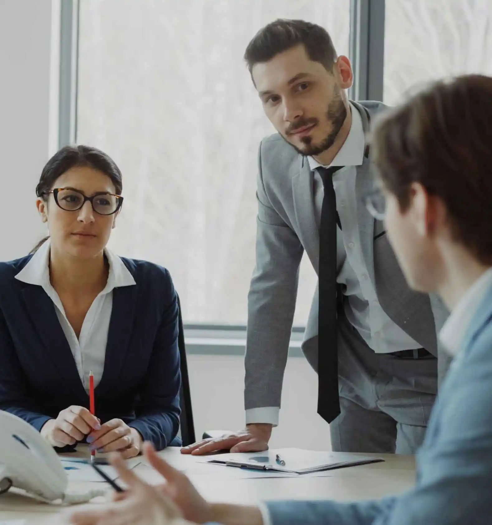 team discussing business plans in office
